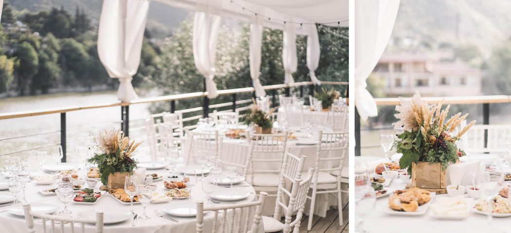 Mesa de jantar para convidados na geórgia em casamento georgiano com natureza ao fundo